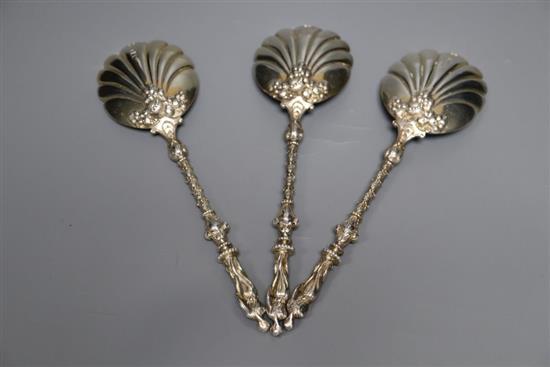 A set of three late Victorian silver fancy serving spoons with figural terminals, Goldsmiths & Silversmiths Co Ltd, London, 1899